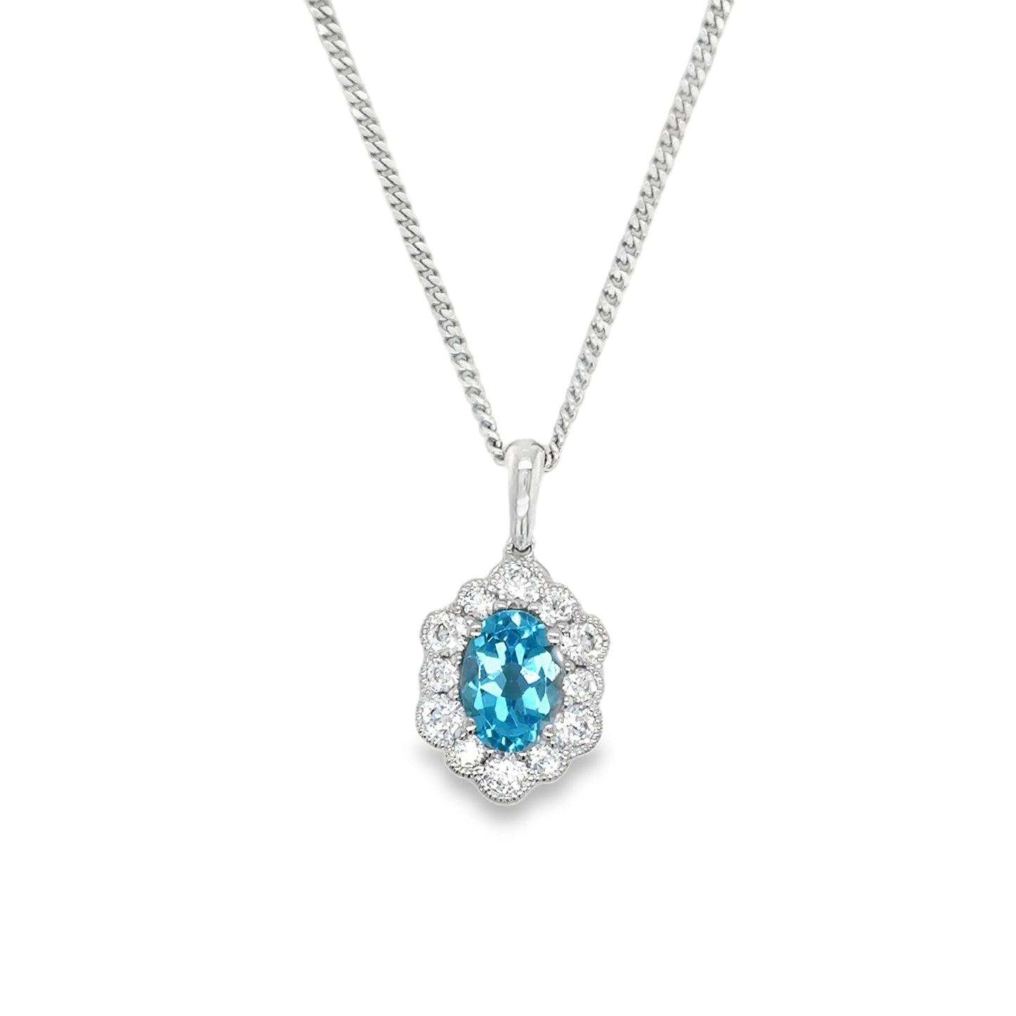 Sterling Silver Oval Blue Topaz and CZ Halo Antique Style Pendant
