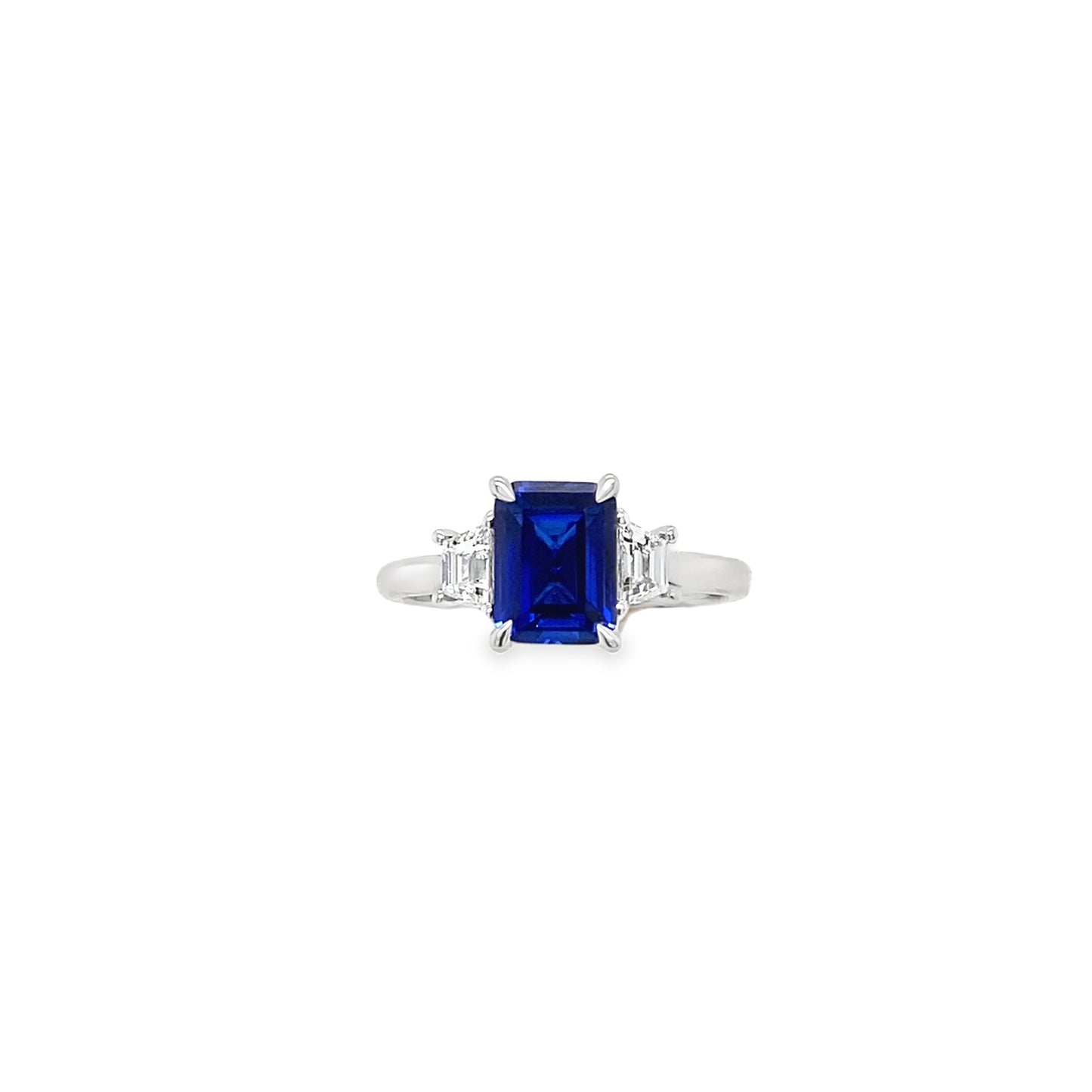 9ct White Gold Emerald Cut Cultured Sapphire Ring with Cultured Diamond Trapezium Shoulders .40ct