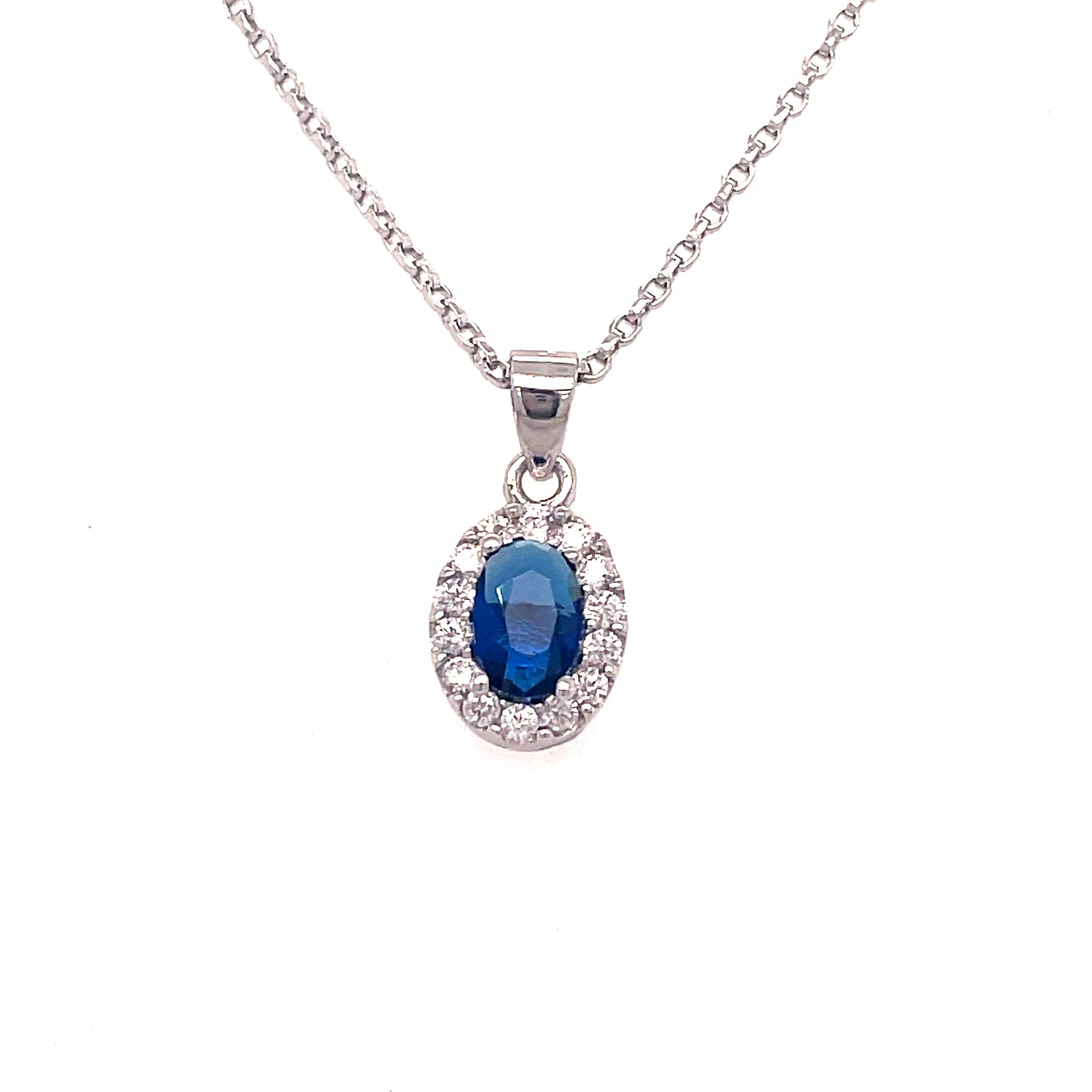Sterling Silver Oval Blue CZ Pendant with White CZ Halo
