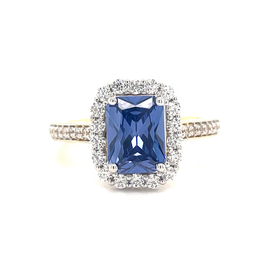 9ct  cubic zirconia and blue stone emerald cut cluster ring with cubic zirconia shoulders