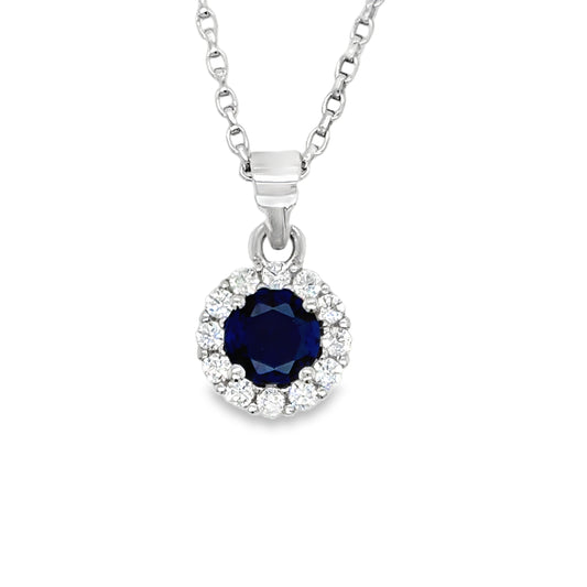 Sterling Silver Blue CZ Pendant with White CZ Halo