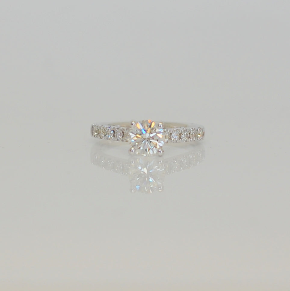 18ct White Gold Solitaire With Dimond Shoulders .83ct .29ct