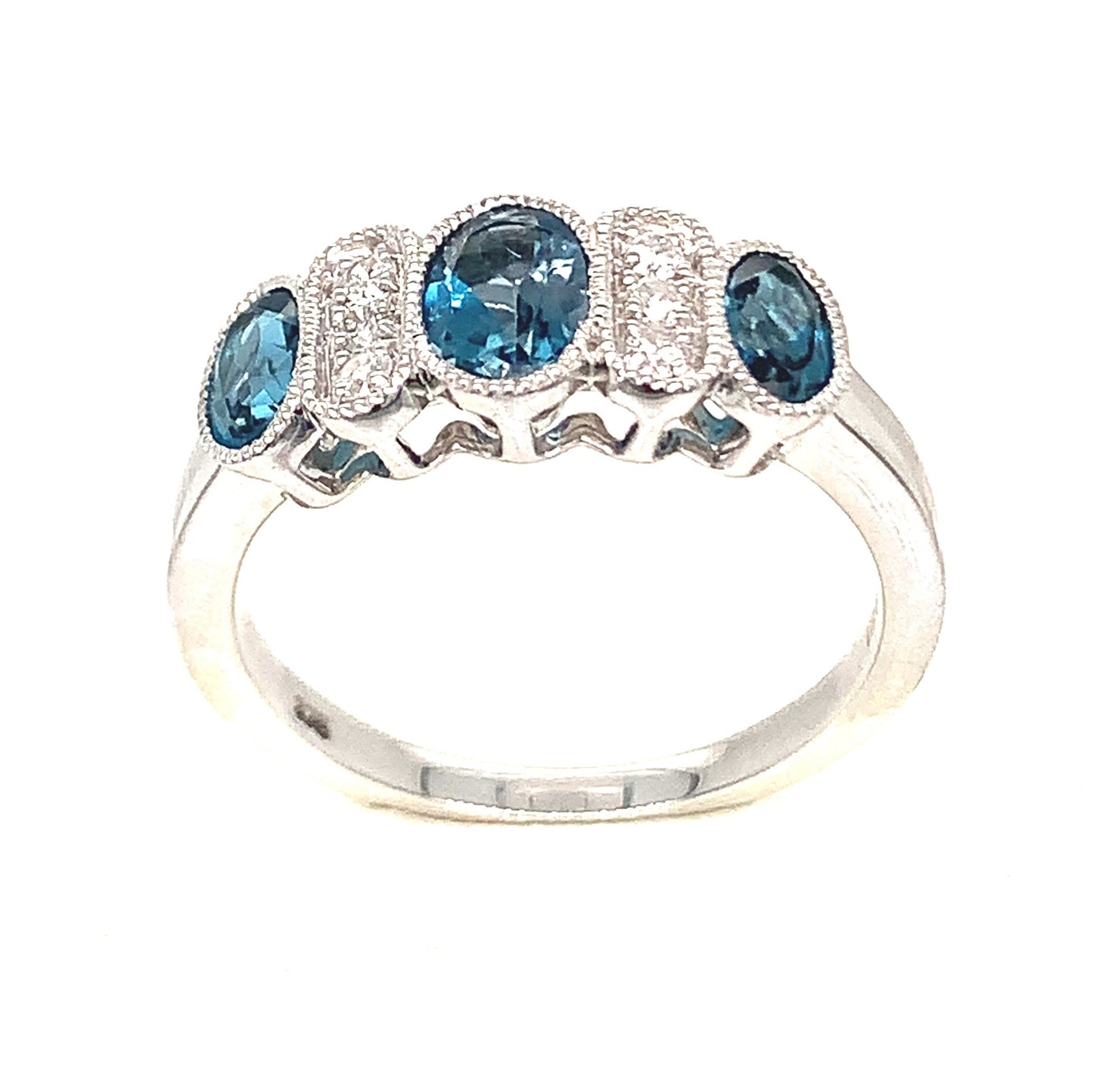 9ct White Gold Diamond And Blue Topaz Rubover Set Ring