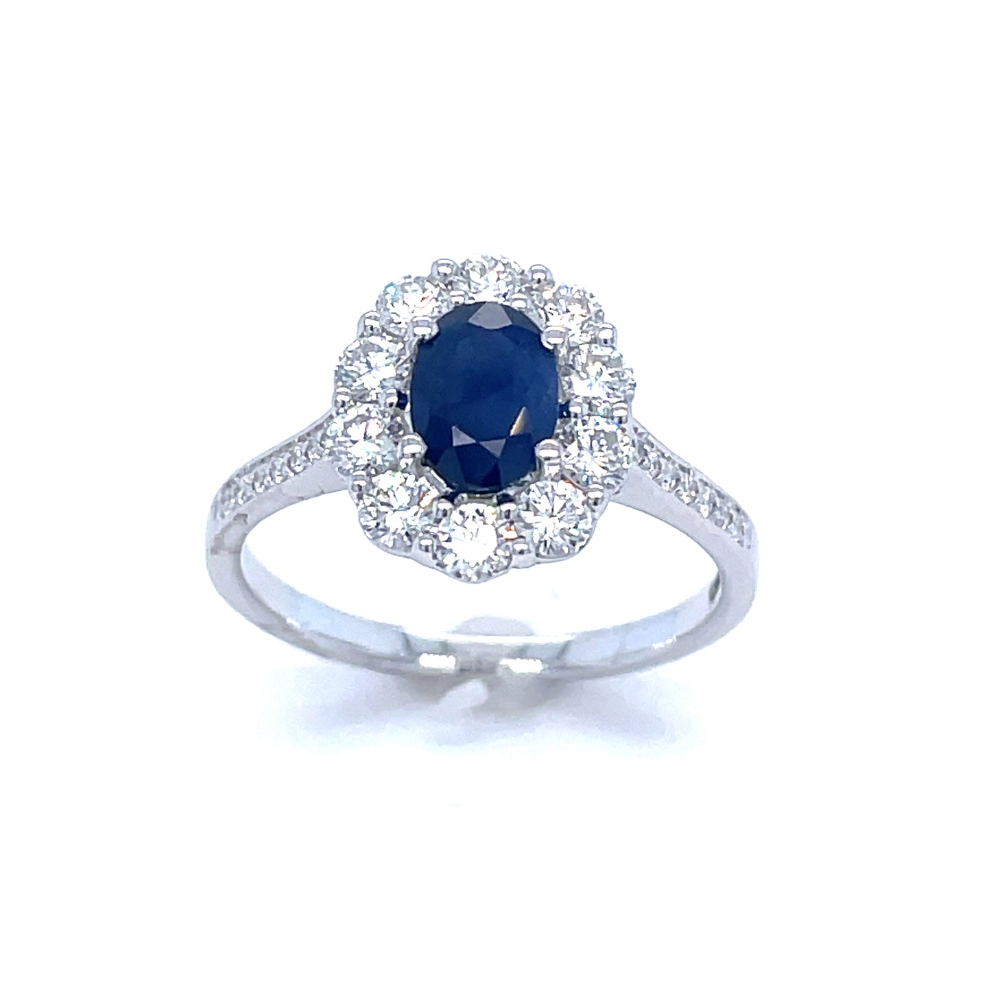 9ct White Gold Sapphire And Diamond Cluster.77ct Ring