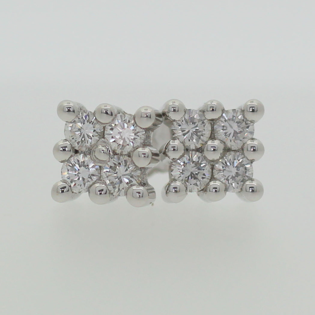 18 White Gold Diamond Studs With Eight Brilliant Diamonds.