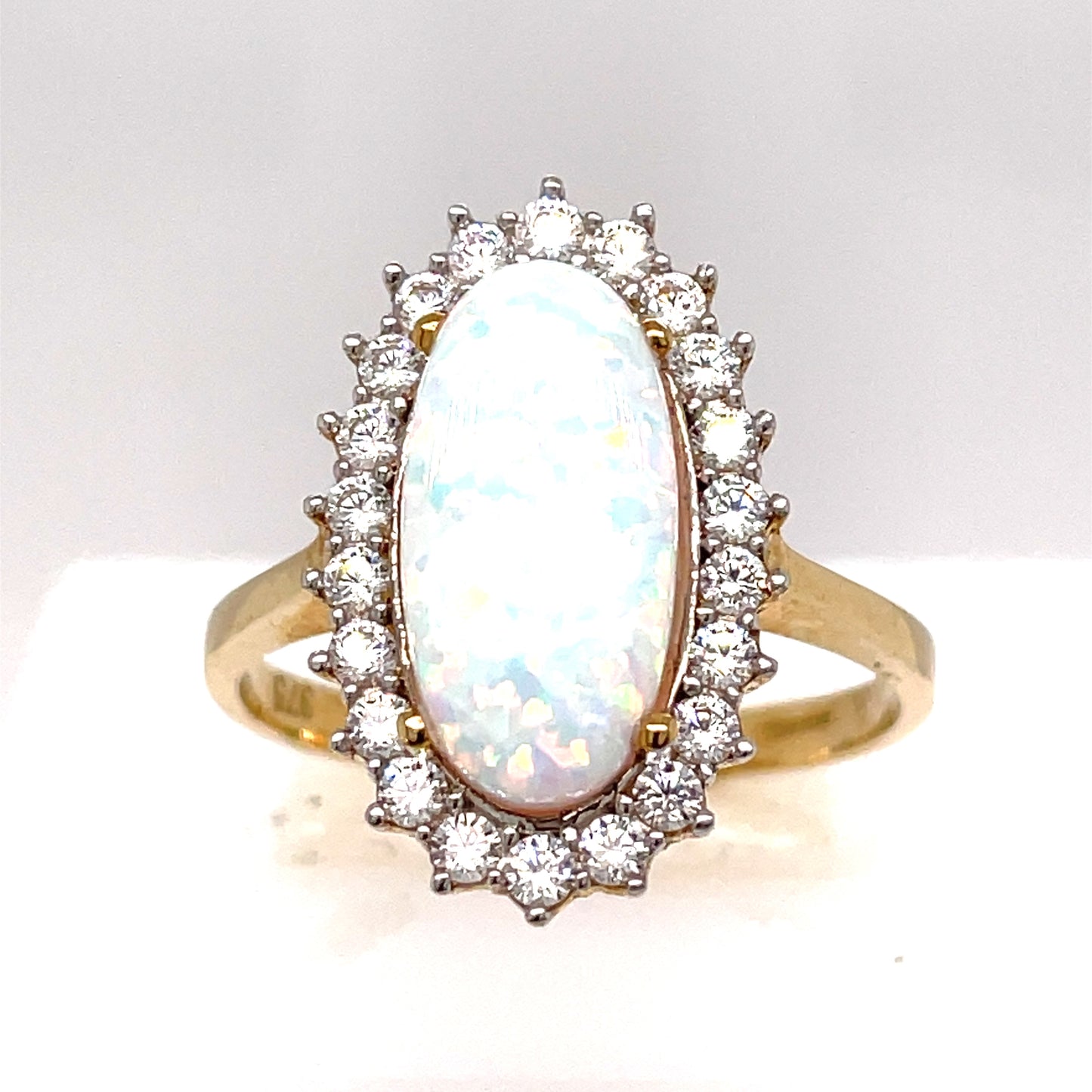 9ct Gold Oval Opal Ring with CZ Halo