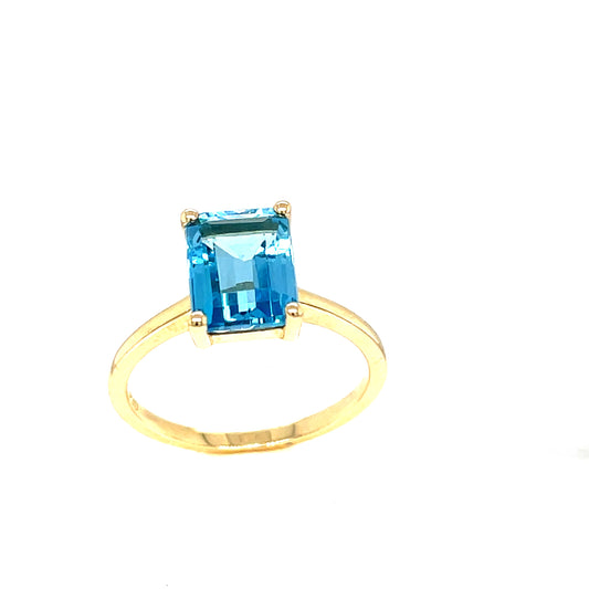 9ct Gold Blue Topaz Four Claw Rectangular Solitaire Ring