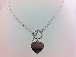 Sterling Silver Tbar / Heart Disc On A Figaro Bracelet