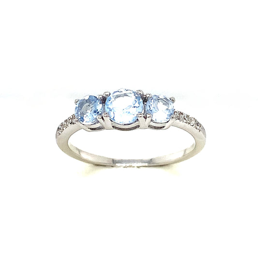 Sterling Silver Light Blue 3 Stone And Cubic Zirconia Ring