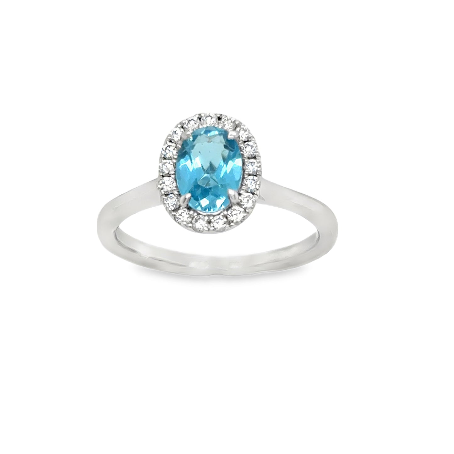 Platinum Blue Topaz Oval Cut Ring With Diamond Halo .17ct