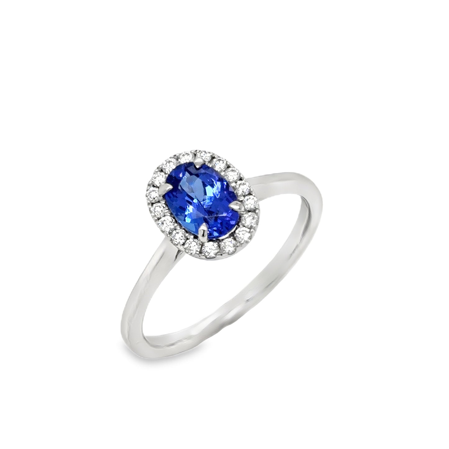 Platinum Tanzanite Oval Cut Ring With Diamond Halo .17ct