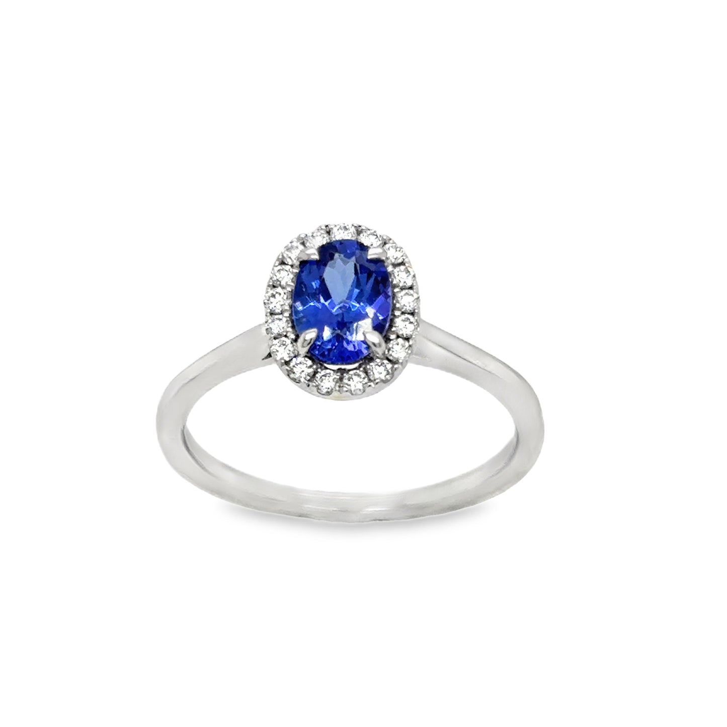 Platinum Tanzanite Oval Cut Ring With Diamond Halo .17ct