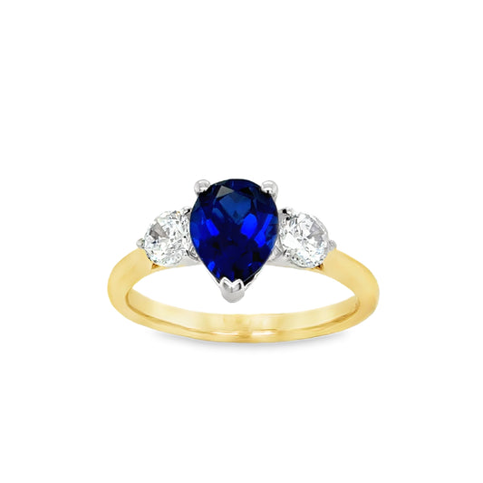 9ct Yellow Gold Pear Cut Created Sapphire Ring with Round CZ Shoulders
