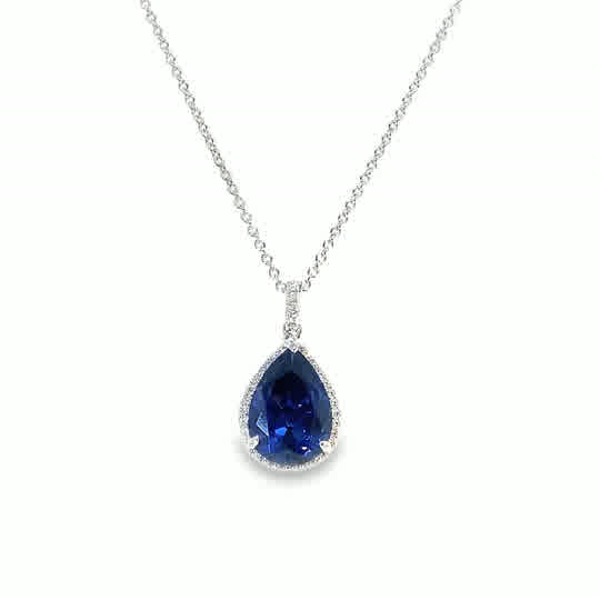 Sterlng Silver CZ Blue Pear Pendant With Halo