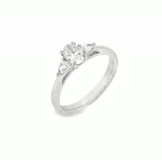 Platinum 3 Stone Oval Cut Centre Diamond Ring With Pear Cut Shoulders .70ct