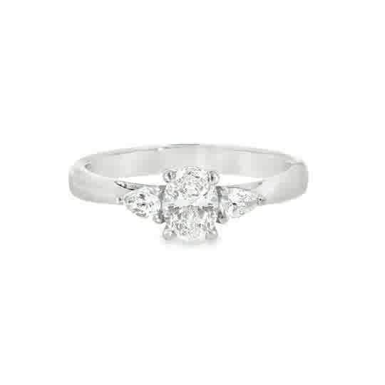 Platinum 3 Stone Oval Cut Centre Diamond Ring With Pear Cut Shoulders .70ct