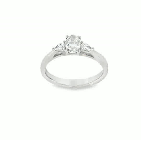 Platinum 3 Stone Oval Cut Centre Diamond Ring With Pear Cut Shoulders .70ct