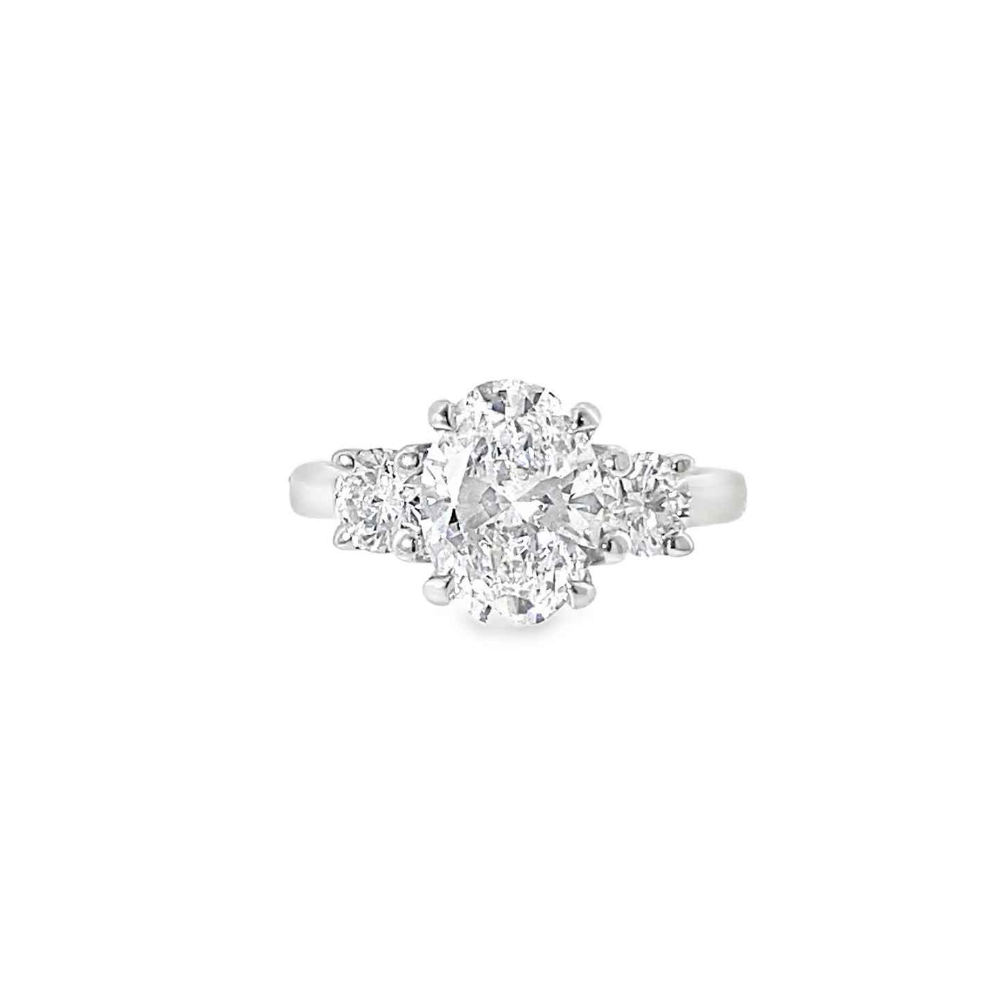Platinum 3 Stone Oval Cut Centre Cultured Diamond Ring With Round Brilliant Shoulders 2.64ct