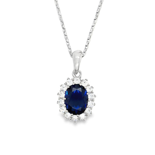 Sterling Silver Oval Blue CZ Pendant with White CZ Halo