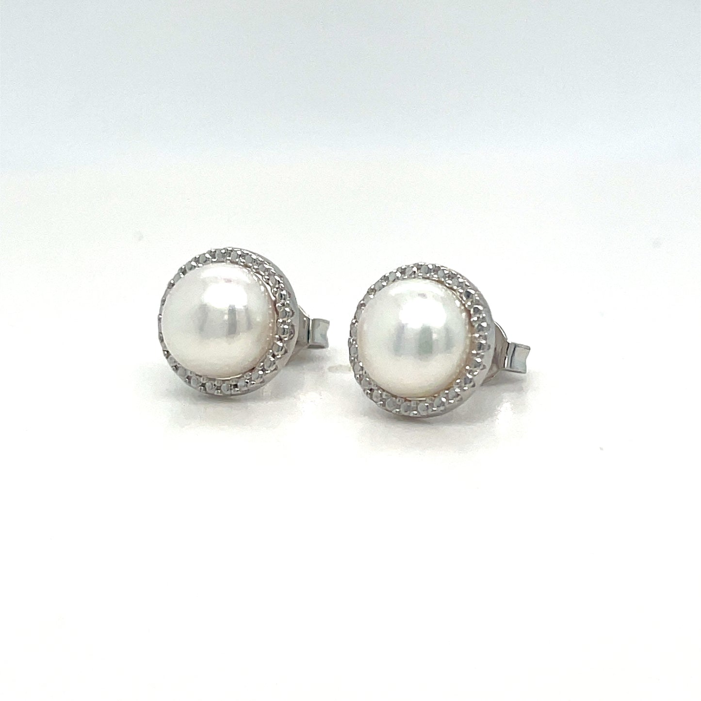 9CT WHITE GOLD FRESHWATER PEARL AND CUBIC ZIRCONIA HALO STUD EARRING