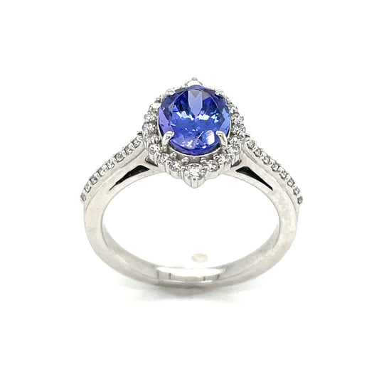PLATINUM OVAL HALO NATURAL SAPPHIRE AND DIAMOND RING .40CT