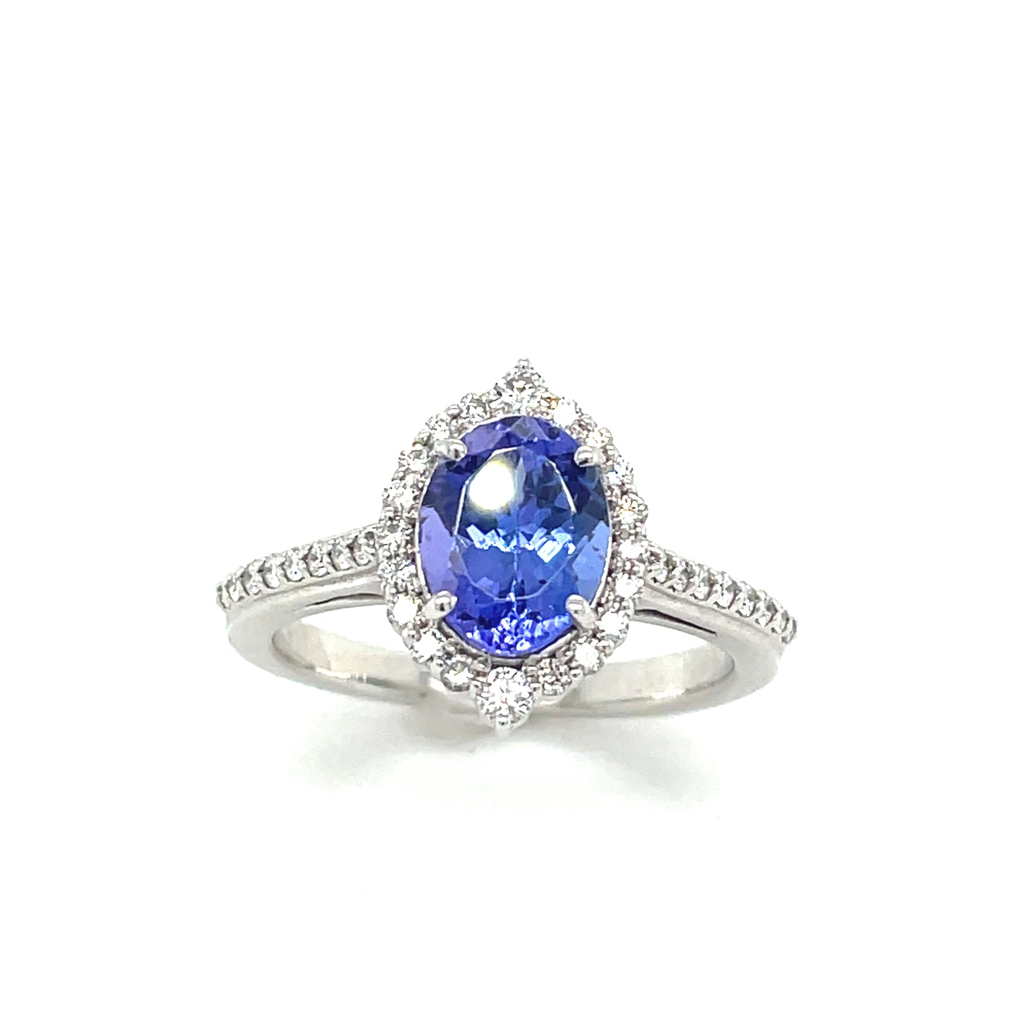 PLATINUM OVAL HALO NATURAL SAPPHIRE AND DIAMOND RING .40CT