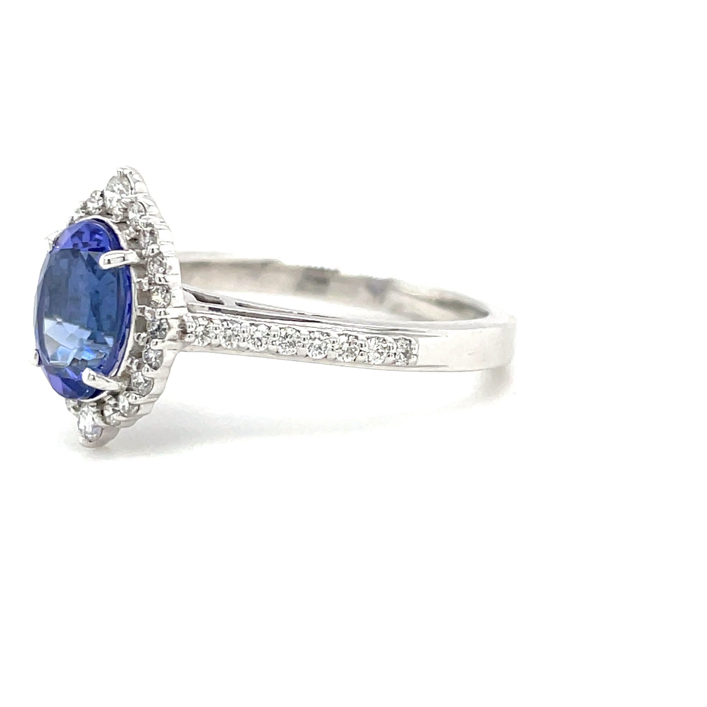 PLATINUM OVAL HALO NATURAL SAPPHIRE AND DIAMOND RING .40CT