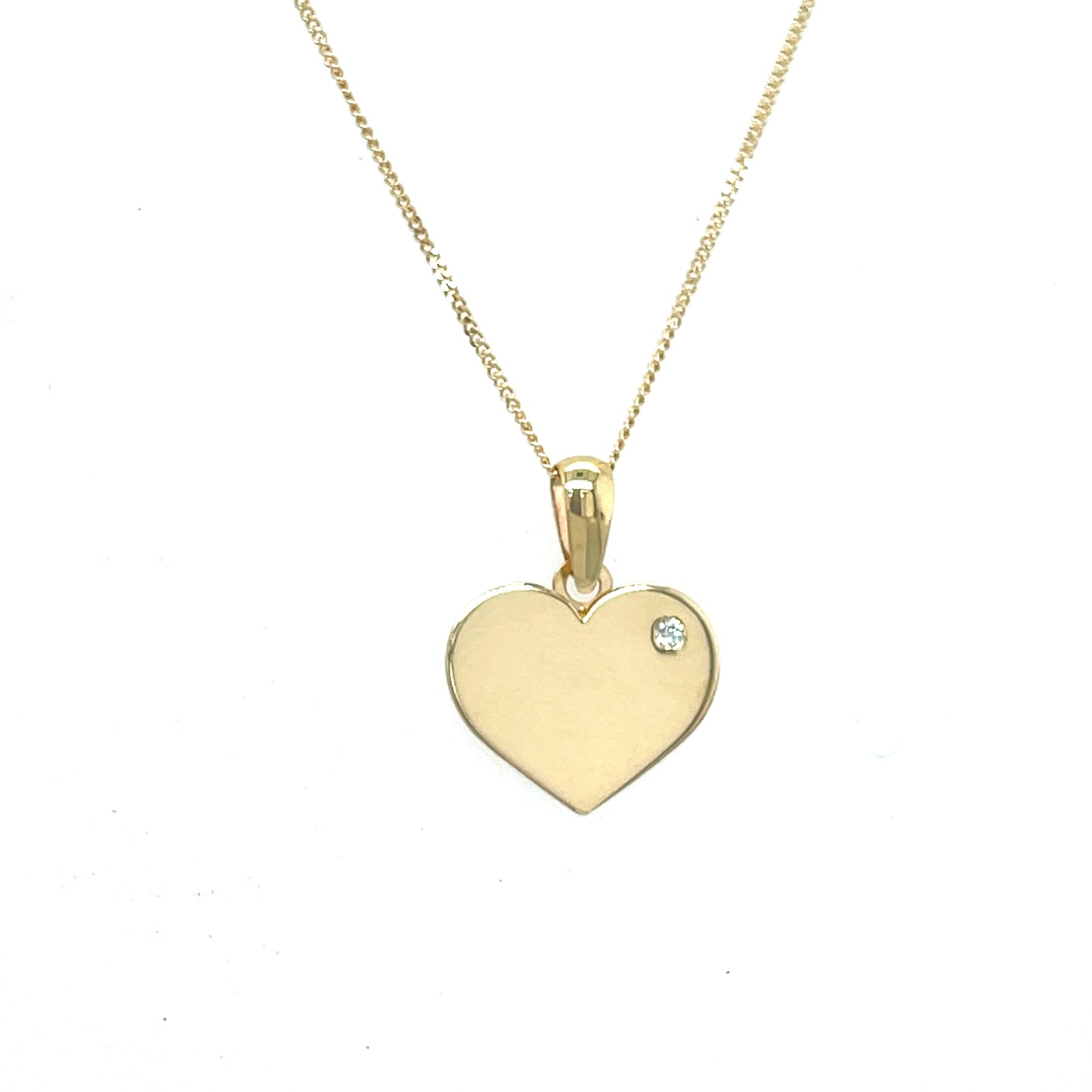 9ct heart disc with single cubic zirconia