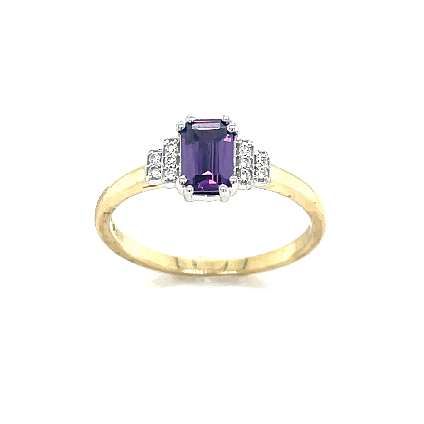 9ct emerald cut Amethyst with cubic zirconia step shoulders