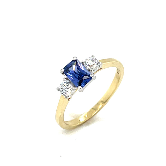 9CT Emerald Cut 3 Stone Cubic Zirconia and Blue Stone Dress Ring