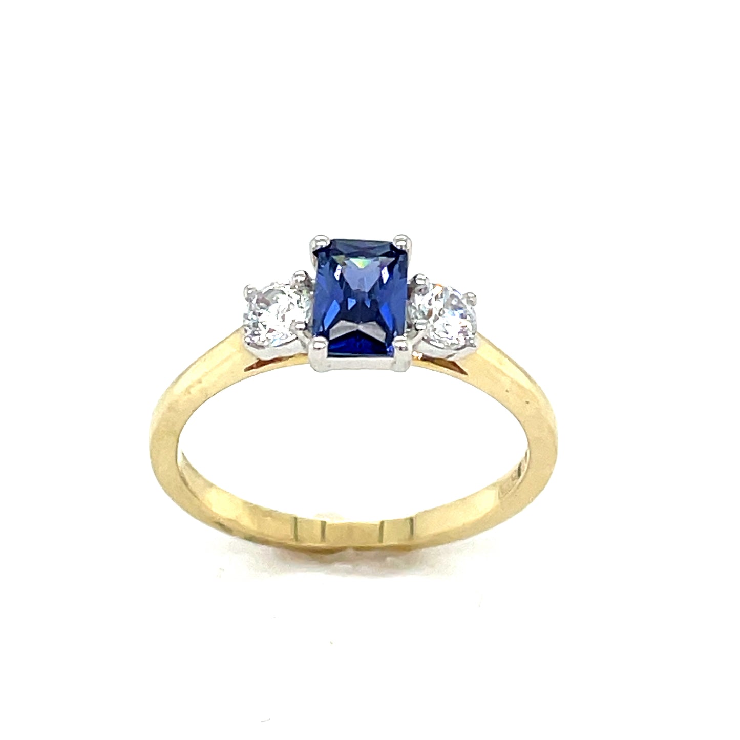 9CT Emerald Cut 3 Stone Cubic Zirconia and Blue Stone Dress Ring