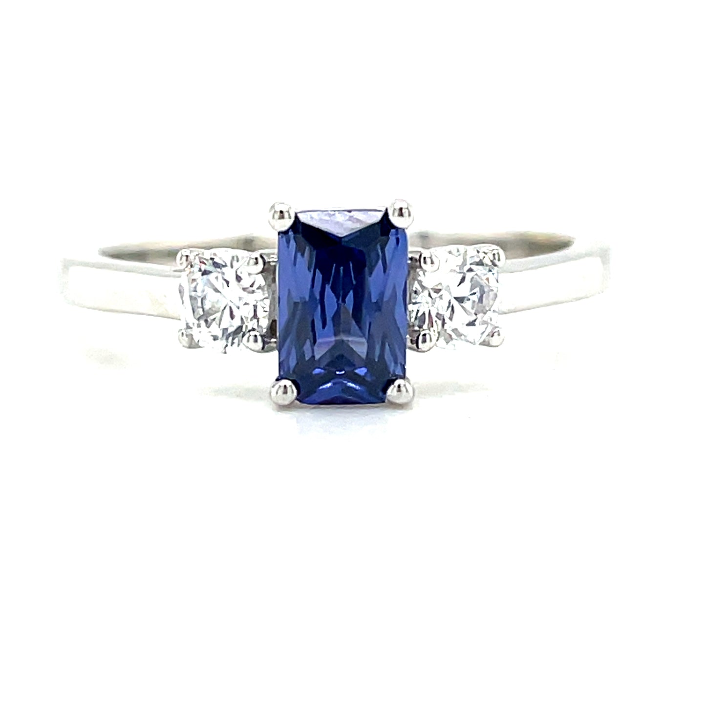 9CT White Gold Emerald Cut 3 Stone Cubic Zirconia and Blue Stone Dress Ring