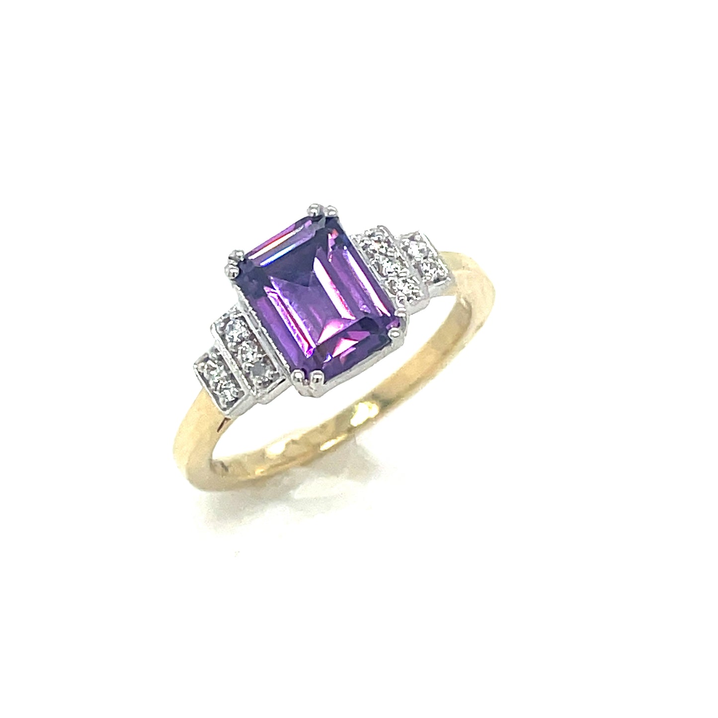 9CT Emerald Cut Cubic Zirconia and Purple Stone Dress Ring with Graduated Shoulders