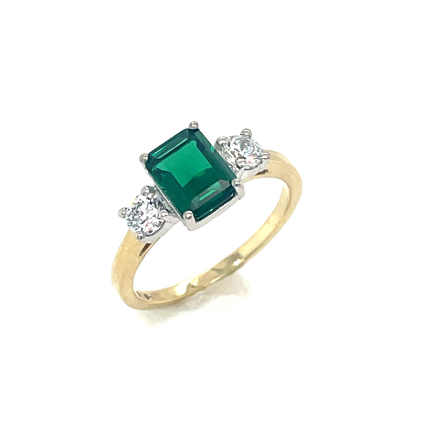 9ct 3 stone with emerald cut green cubic zirconia in centre and 2 white cubic zirconia ring