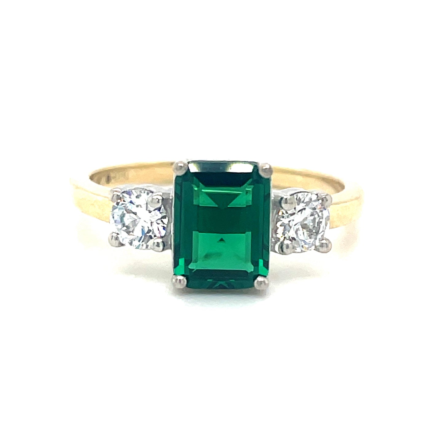 9ct 3 stone with emerald cut green cubic zirconia in centre and 2 white cubic zirconia ring