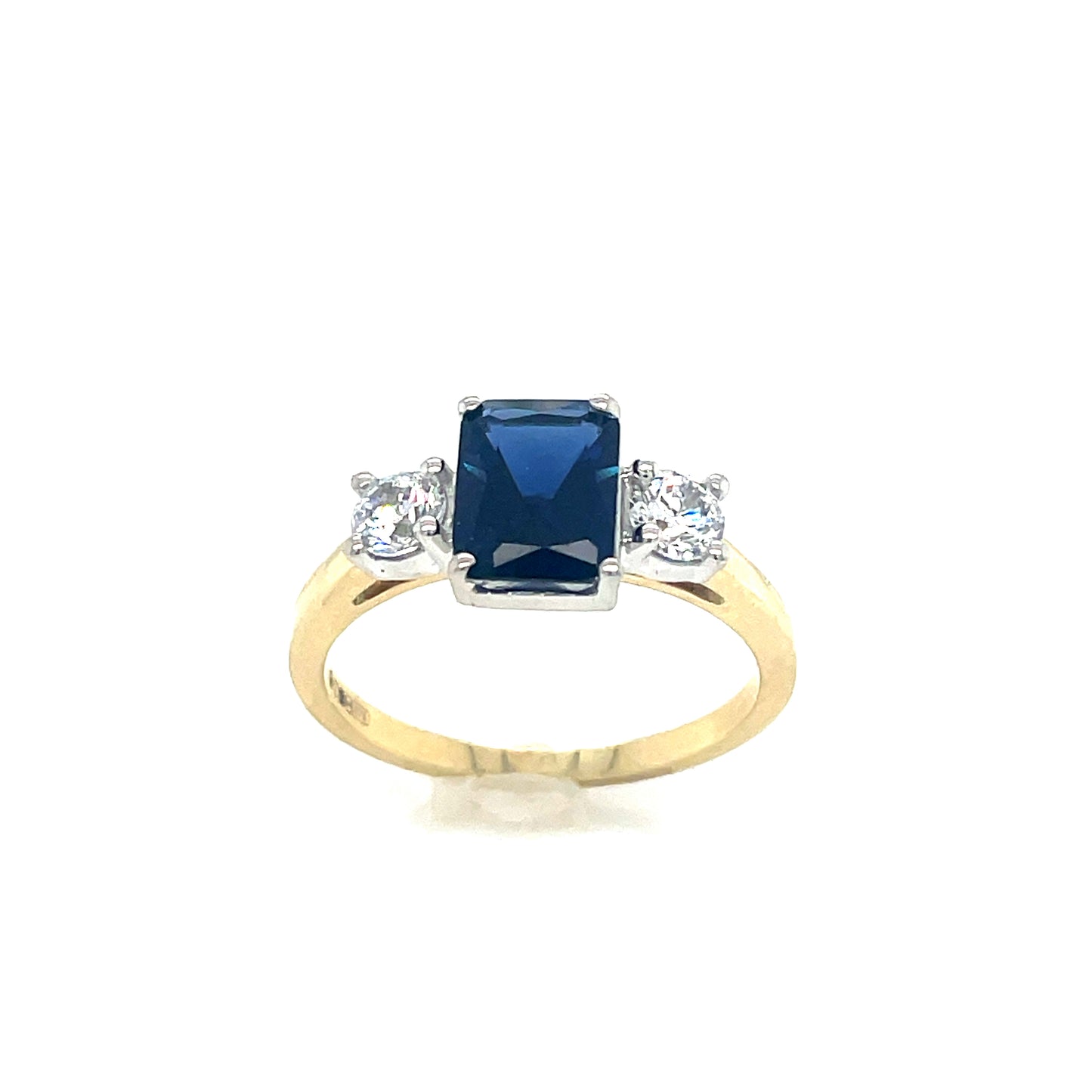 9ct 3 stone emerald cut blue cubic zirconia centre stone with 2 round white cubic zirconia ring