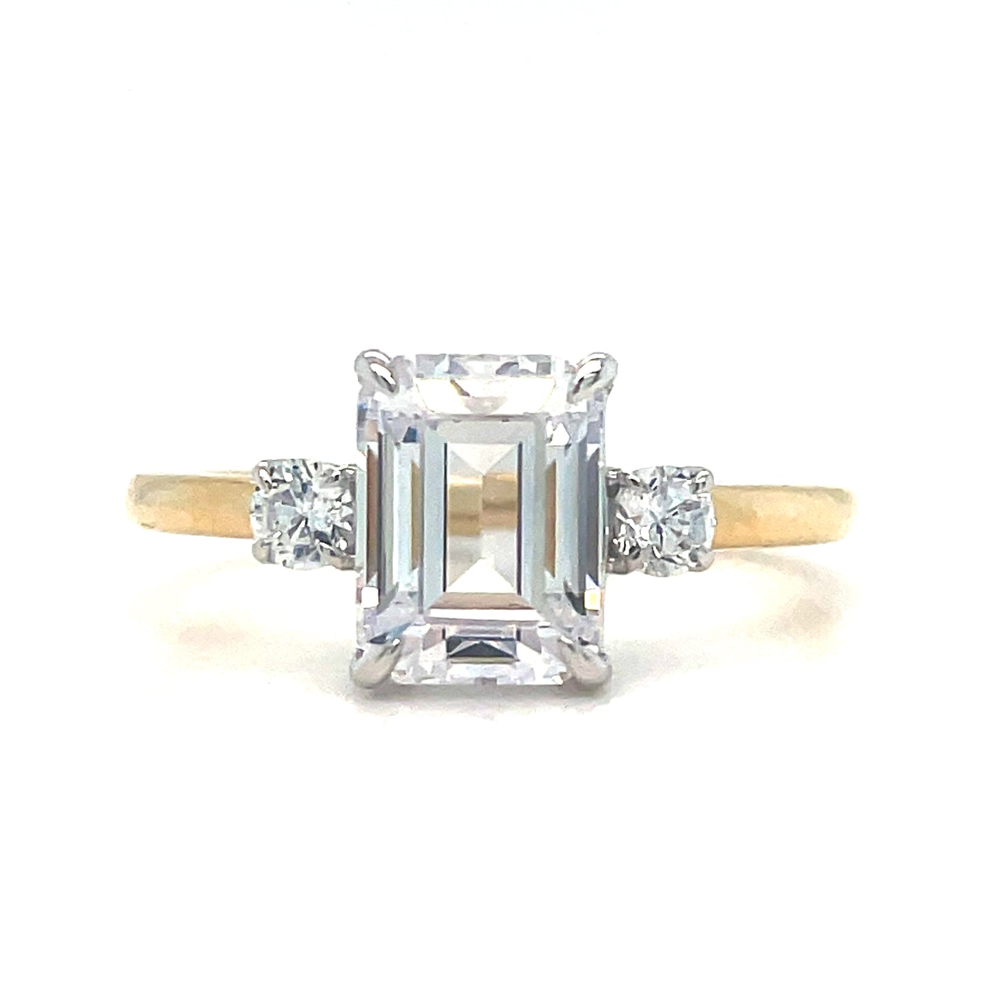 9ct Cubic Zirconia Emerald Cut Solitaire Ring With Round Shoulders