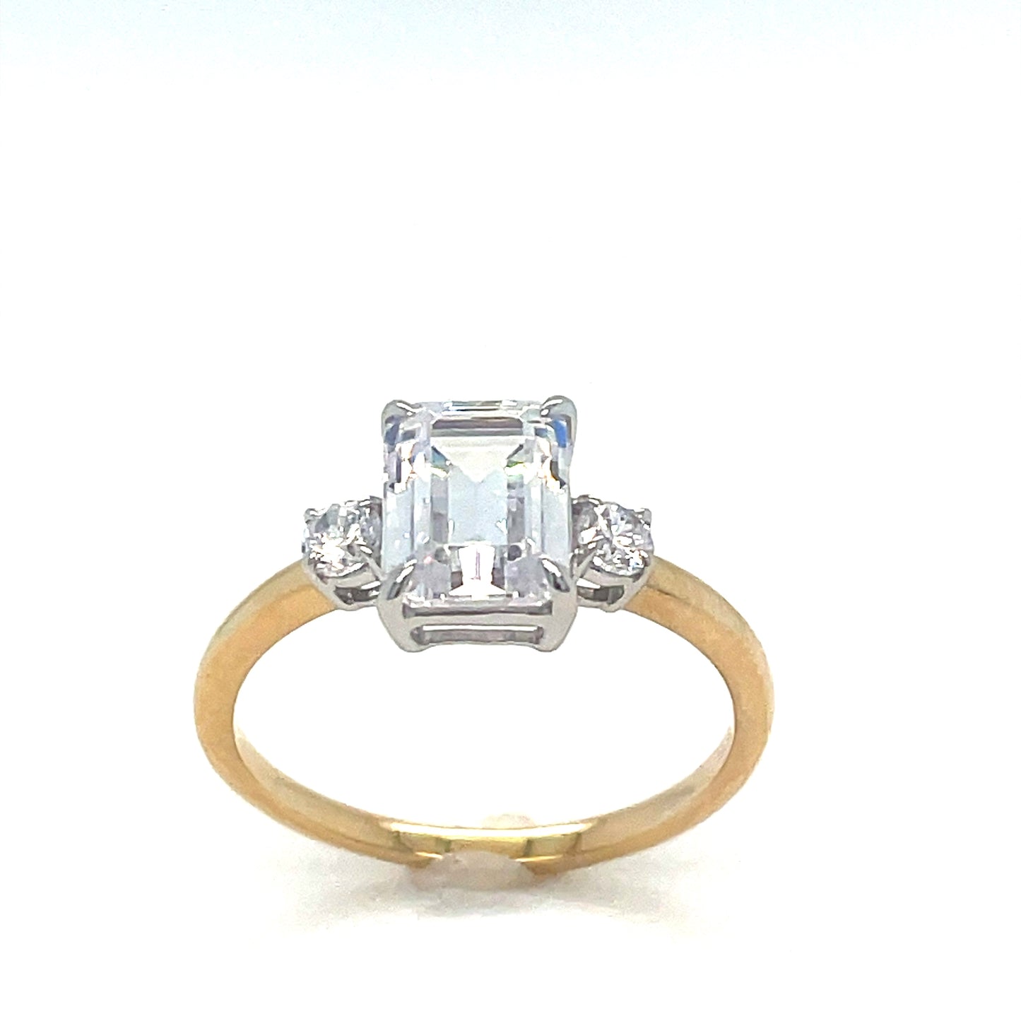 9ct Cubic Zirconia Emerald Cut Solitaire Ring With Round Shoulders