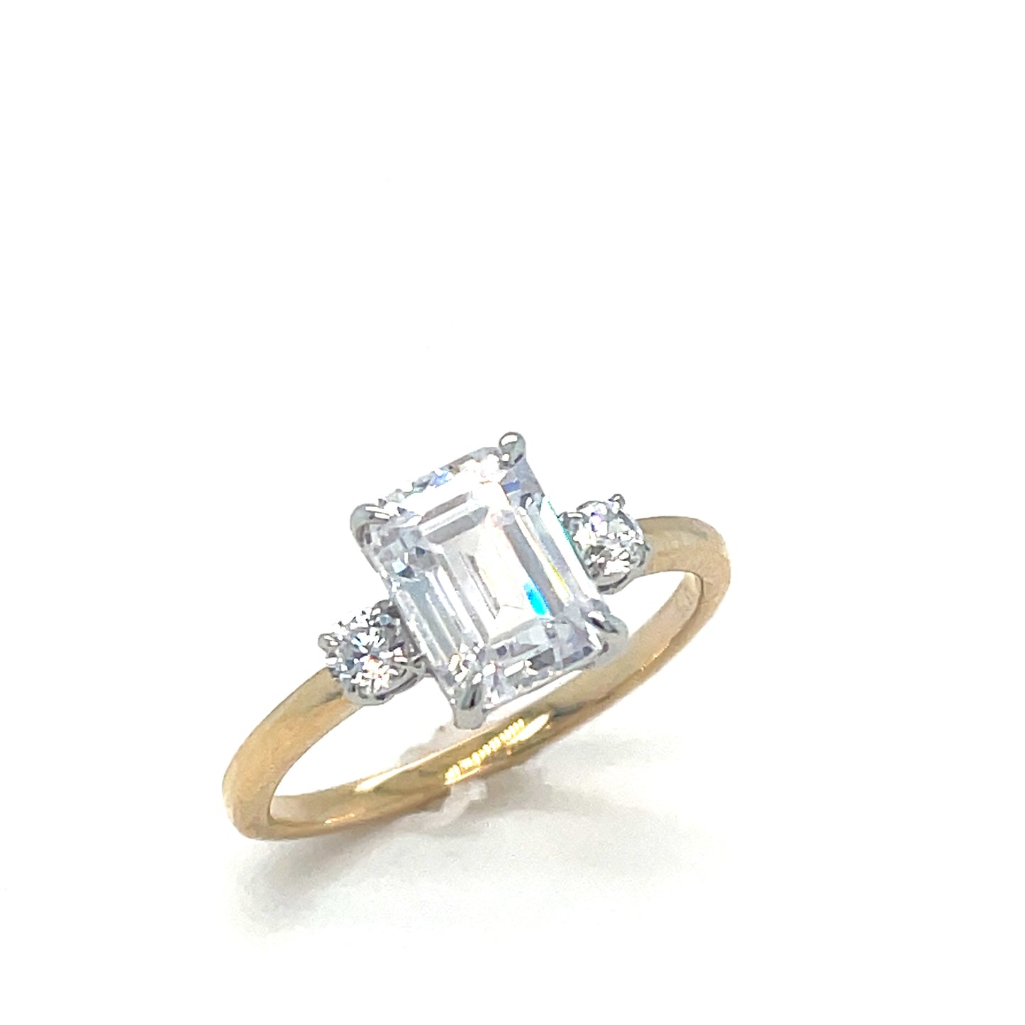 9ct Cubic Zirconia Emerald Cut Solitaire Ring With Round Shoulders