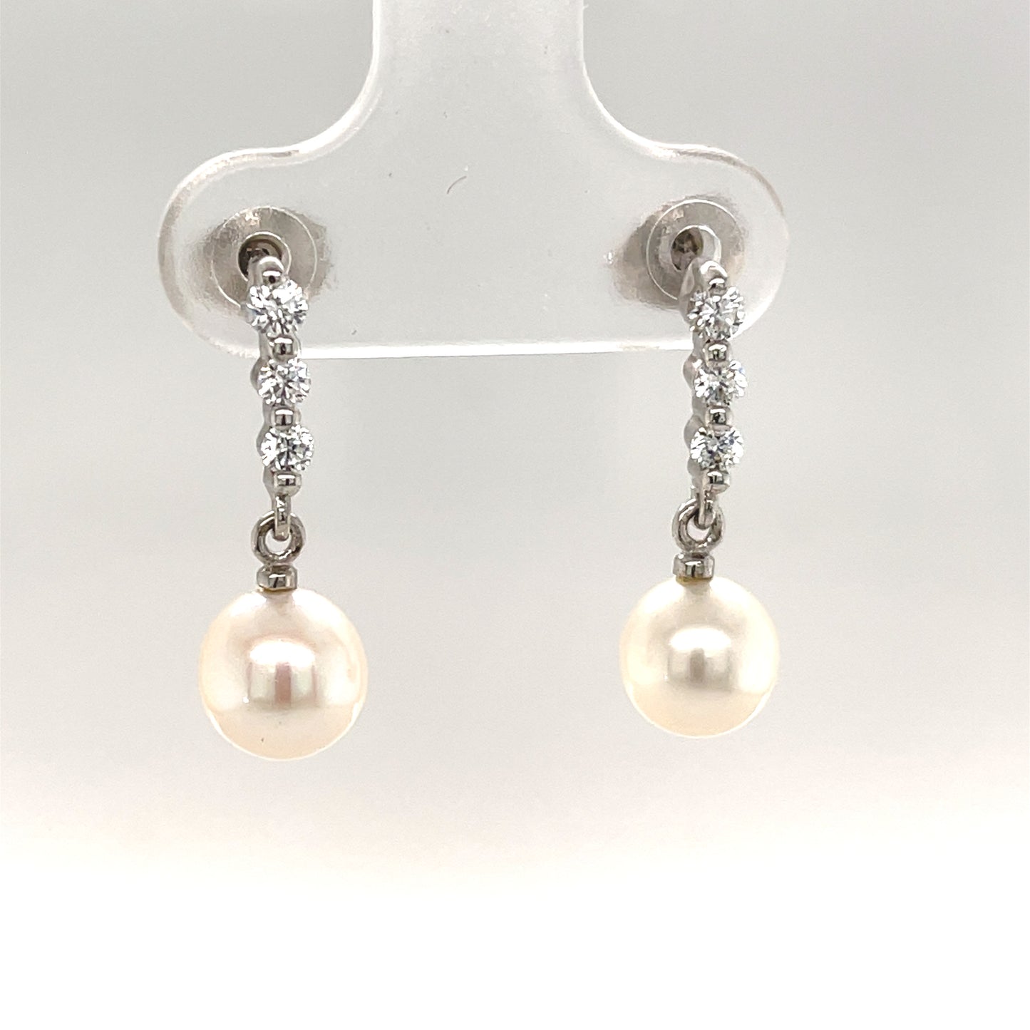 9ct White Gold Pearl And Cubic Zirconia Drop Earring