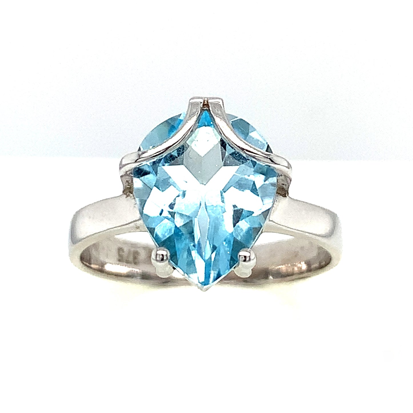 9ct Blue Topaz And Cubic Zirconia Ring