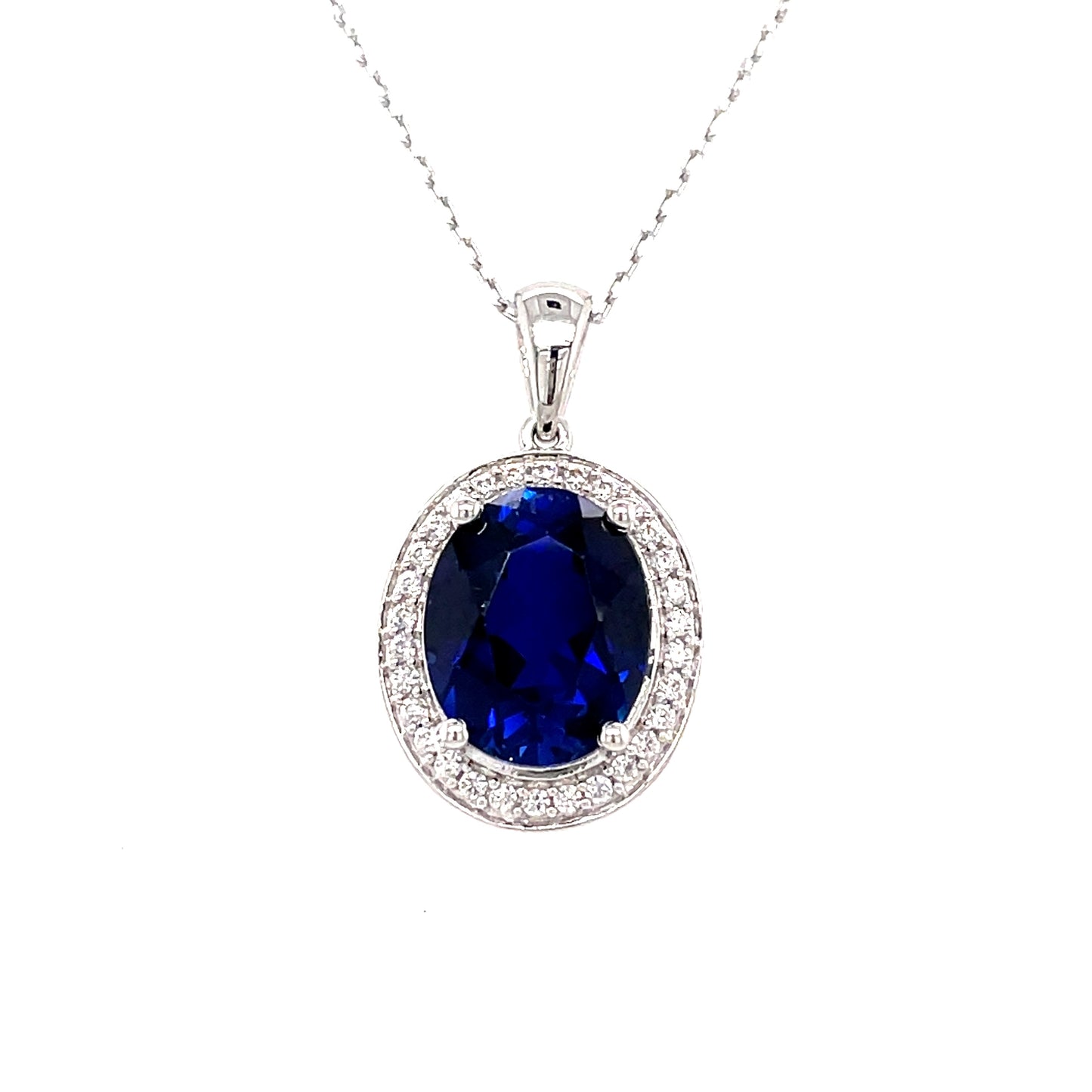 9ct White Gold Sapphire And Cubic Zirconia Oval Pendant