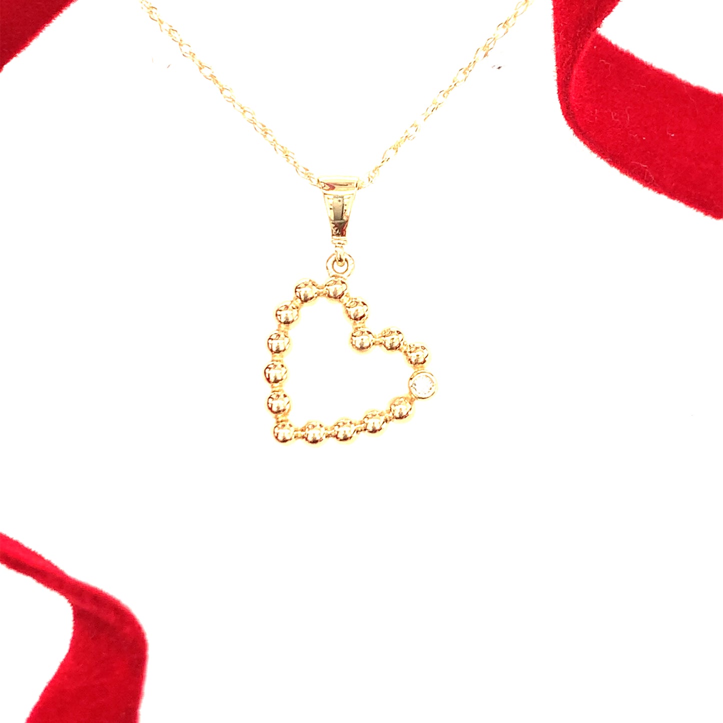 9ct 1 Cubic Zirconia And Plain Ball Heart Pendant