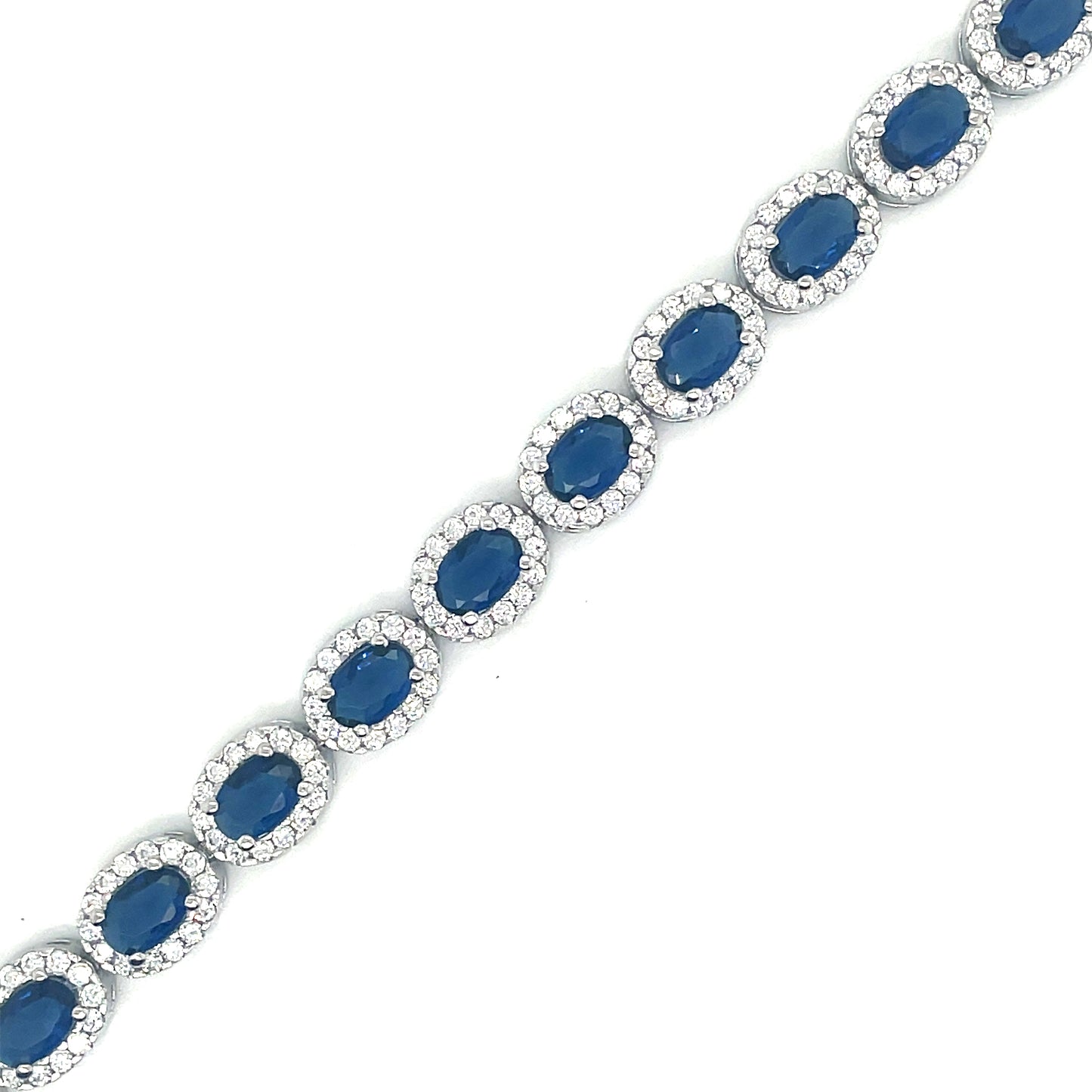 Sterling Silver Oval Cluster Bracelet With Blue Cubic Zirconia