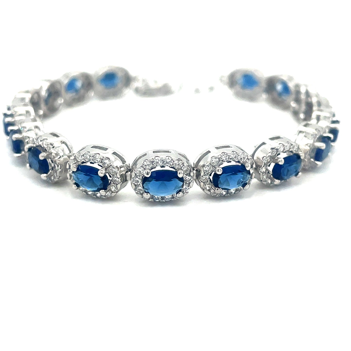 Sterling Silver Oval Cluster Bracelet With Blue Cubic Zirconia