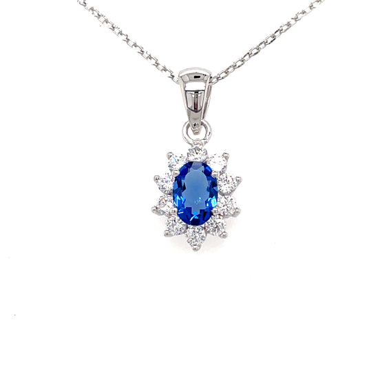 Sterling Silver Cubic Zirconia Oval Cluster With Blue Stone