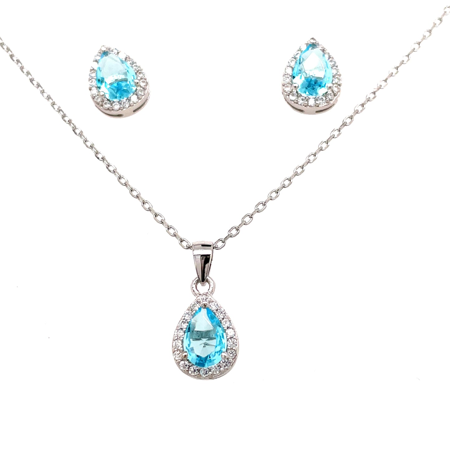Sterling Silver Cubic Zirconia Light Blue Pear Pendant And Earring Set